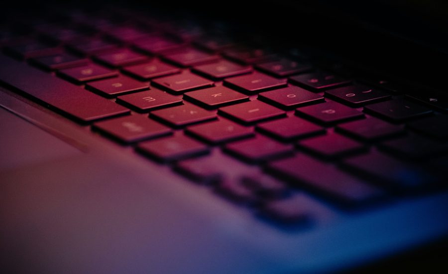 a-close-up-of-a-keyboard-with-a-blurry-background